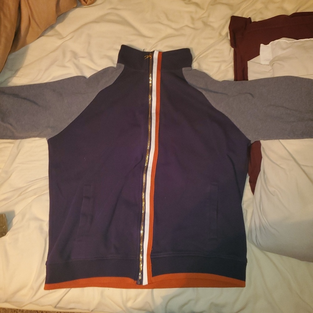 Long sleeved zipped turtle neck